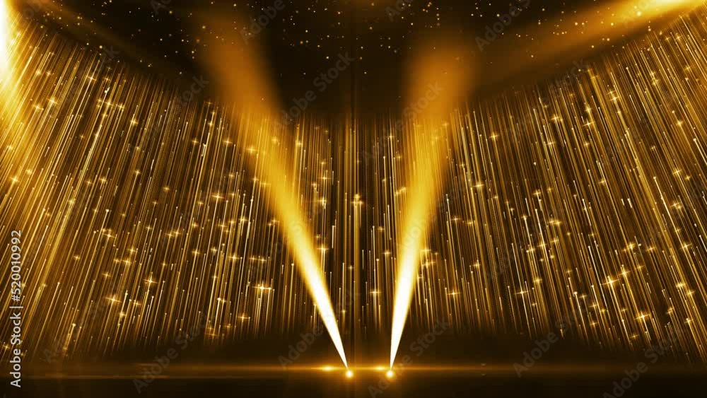 Golden particle light and light illuminate the background of the award stage.