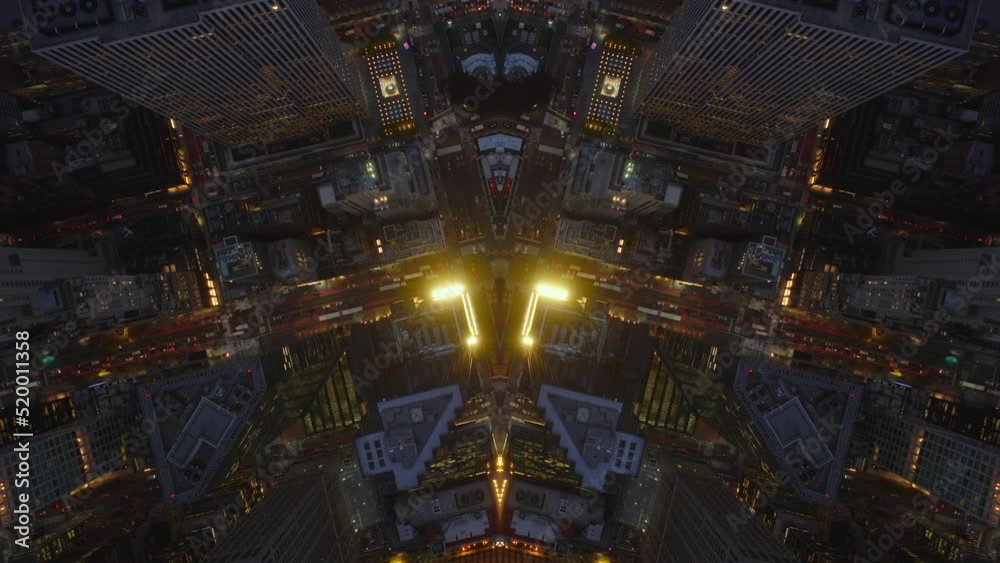 Evening top down view of illuminated streets in city. Abstract computer effect digital composed footage.