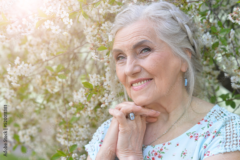 Portrait of beautiful senior woman at park Portrait of beautiful senior woman at park