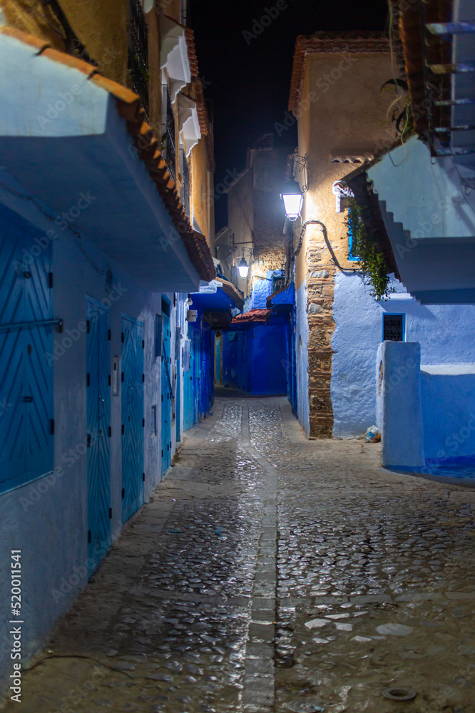 Chefchaouen, Morocco - 17 January 2022 : Alleys of the blue city Chefchaouen by night