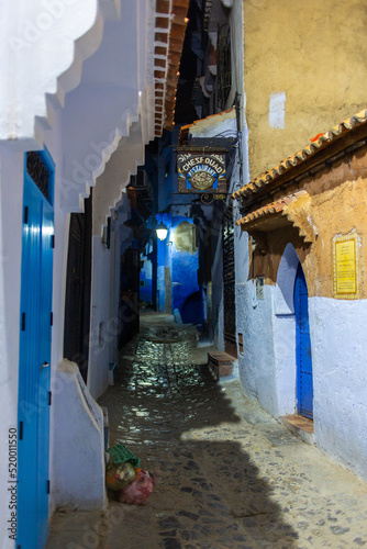 Chefchaouen, Morocco - 17 January 2022 : Alleys of the blue city Chefchaouen by night © Oualid