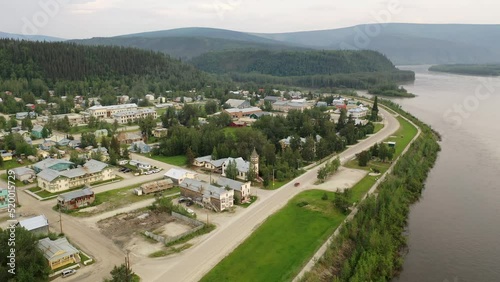Aerial view of Dawson City, the territory of Yukon, Canada. Historic city, Klondike Gold Rush history. Summer, overcast day