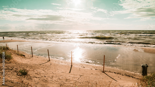 Fototapeta Naklejka Na Ścianę i Meble -  Baltic sea sunset fence