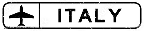 Grunge black italy word with plane icon square rubber seal stamp on white background
