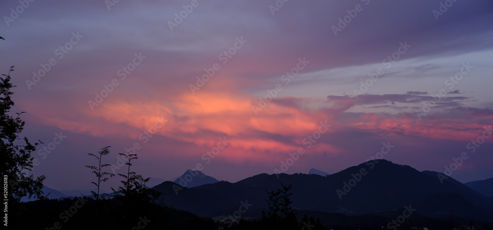The Traunstein is a high mountain in the upper Austrian part of the Salzkammergut, idyllic sunset mountain landscape below Gaisberg, Austria.