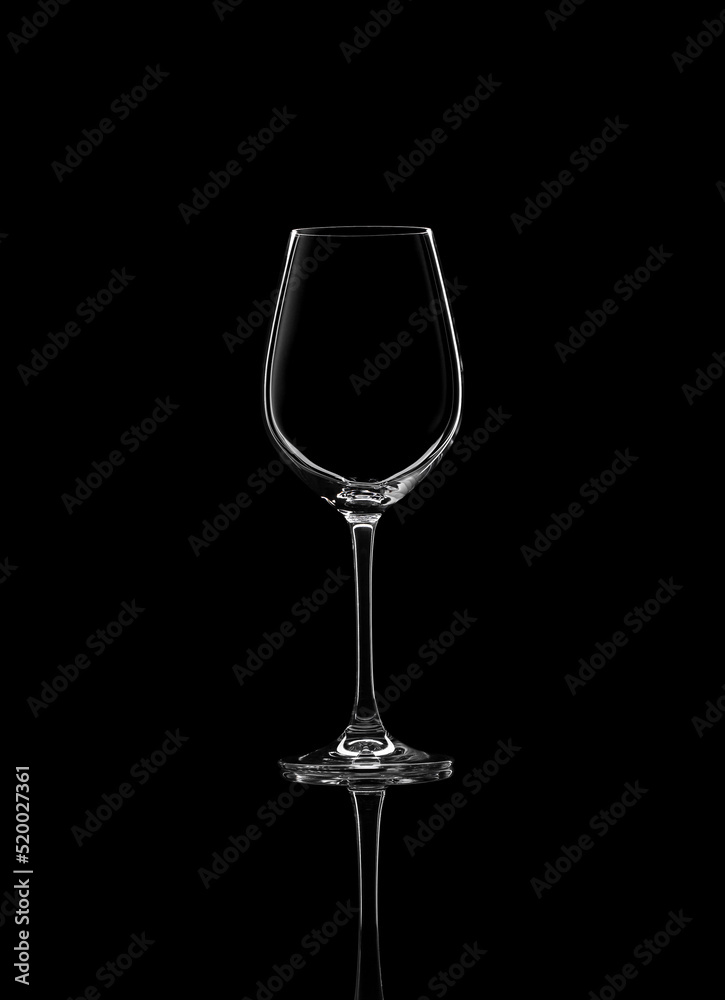 Empty glass for white wine isolated on black background Empty glass for white wine isolated on black background