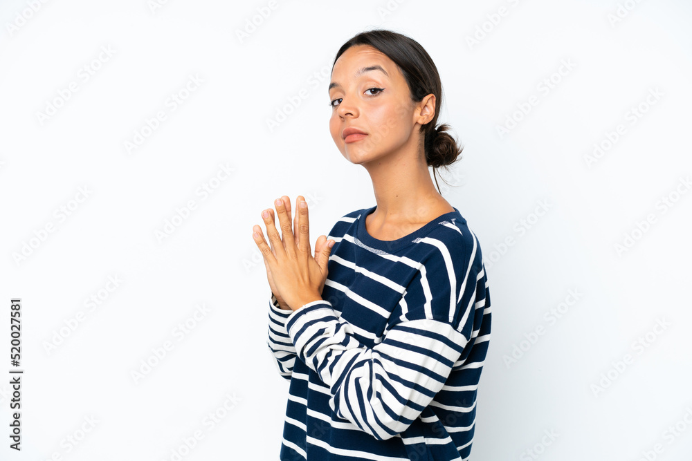 Young hispanic woman isolated on white background scheming something Young hispanic woman isolated on white background scheming something