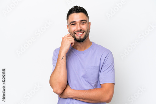 Young Arab handsome man isolated on white background laughing © luismolinero