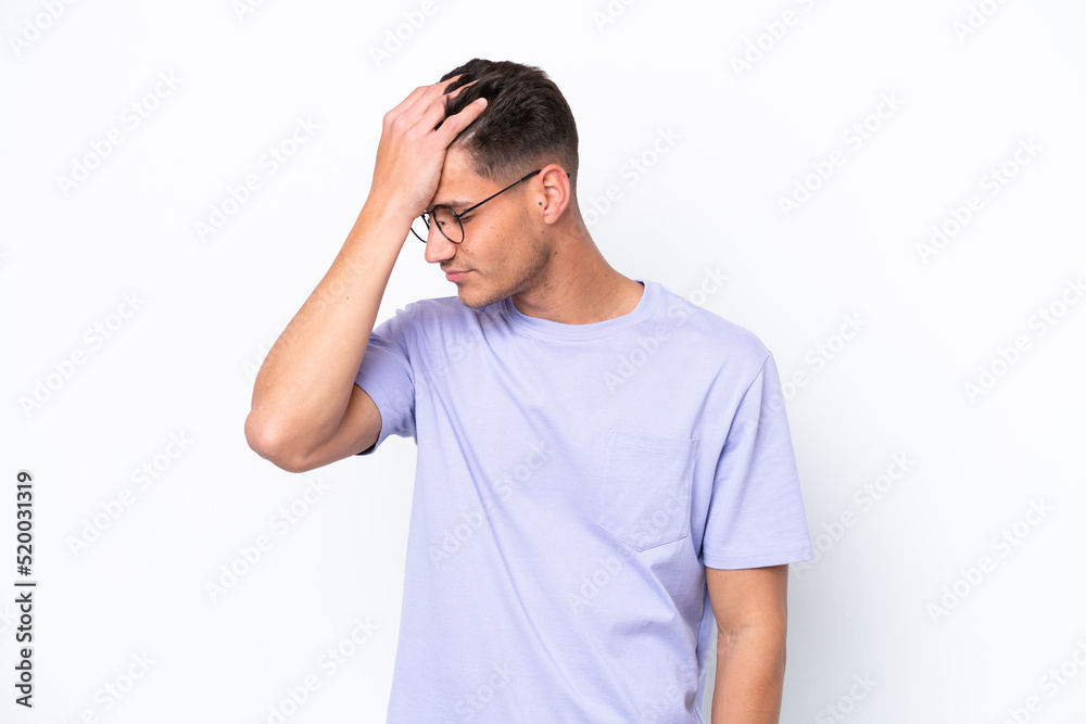 Young caucasian man isolated on white background with headache Young caucasian man isolated on white background with headache