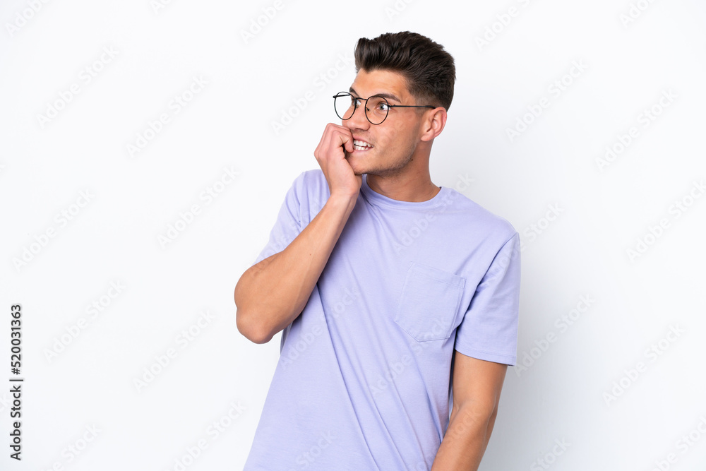 Young caucasian man isolated on white background is a little bit nervous Young caucasian man isolated on white background is a little bit nervous