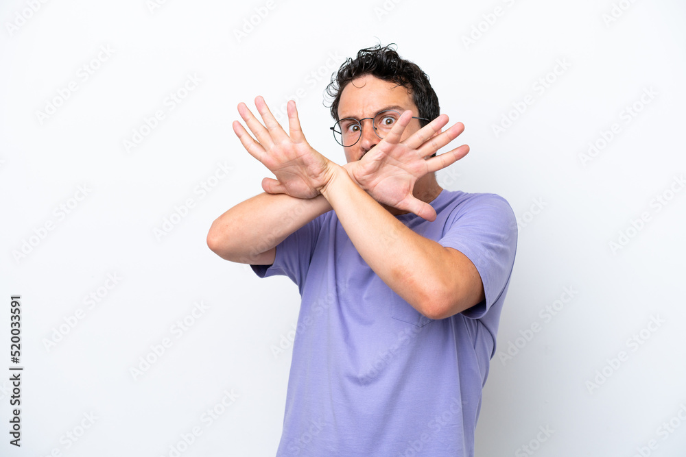 Young man with moustache isolated on white background nervous stretching hands to the front Young man with moustache isolated on white background nervous stretching hands to the front