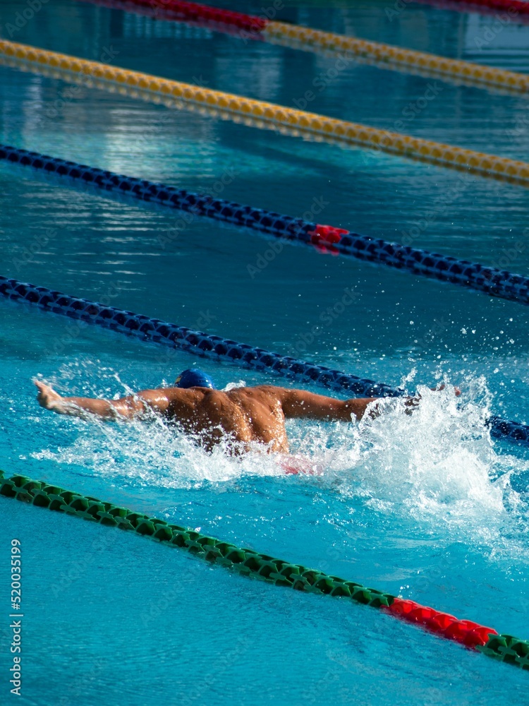 Men swimming in the pool