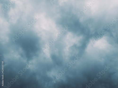 dark clouds that will become rainy are carried by the wind during the rainy season