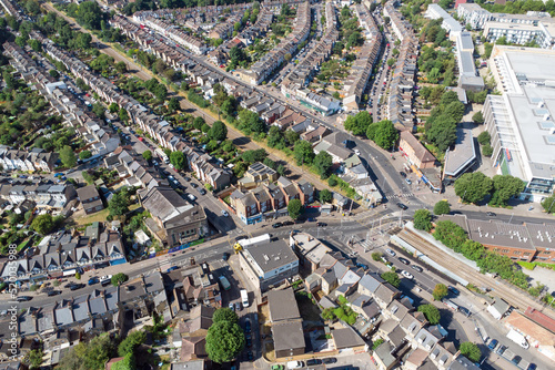 Aerial view of the area of Highams Park including the railway line and level crossing