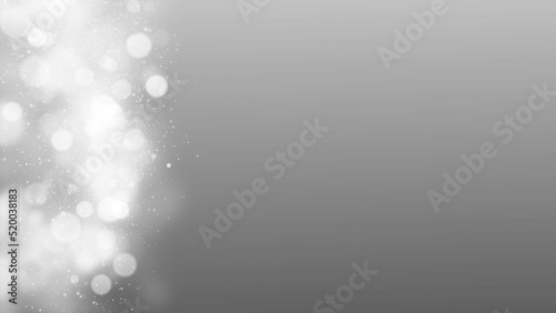 Magical white bokeh holiday background. White snowy abstract background.