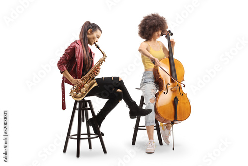 Photography Two young women playing a cello and a sax
