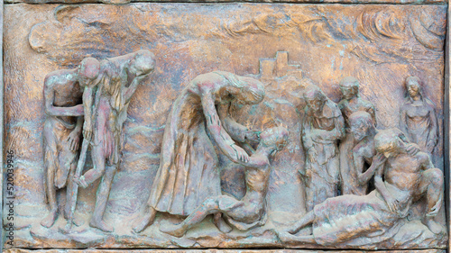 MONOPOLI, ITALY - MARCH 6, 2022: The bronze relief  Jesus at the healing the ...