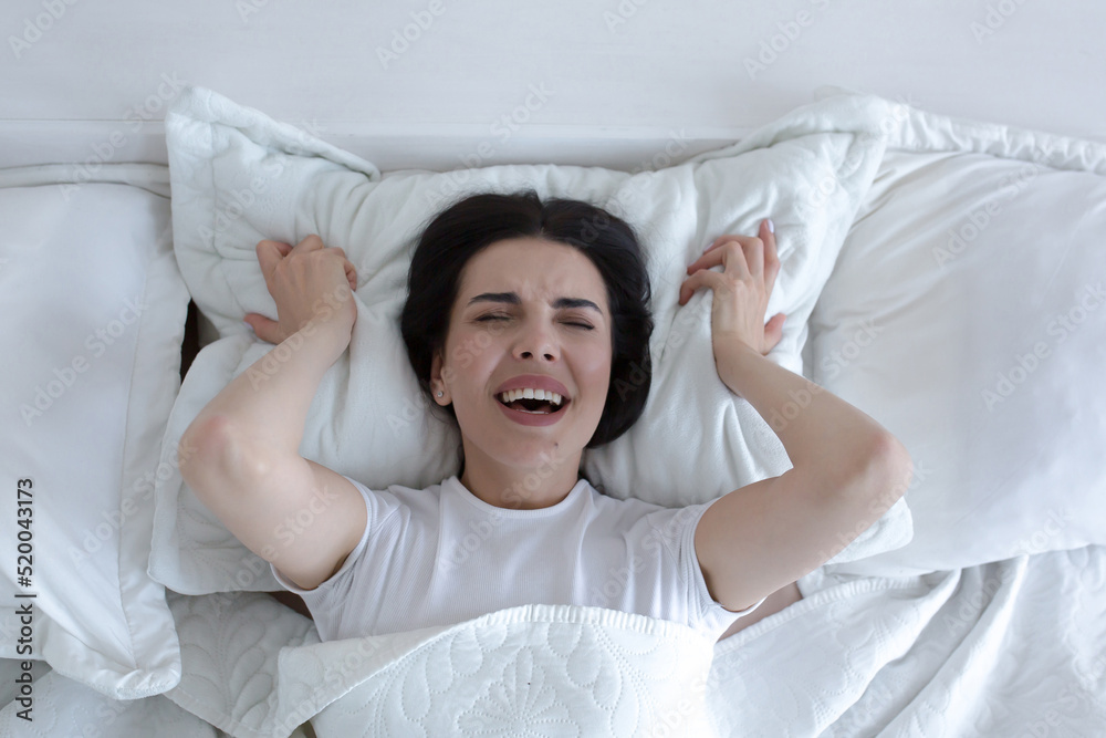 Top View, Depressed Woman Lying In Bed Crying And Screaming With 