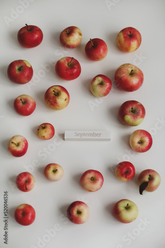 autumn background with fresh ripe red apples isolated on white top view. Hello Autumn concept