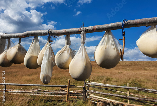 Many cheese molds hung to dry traditionally