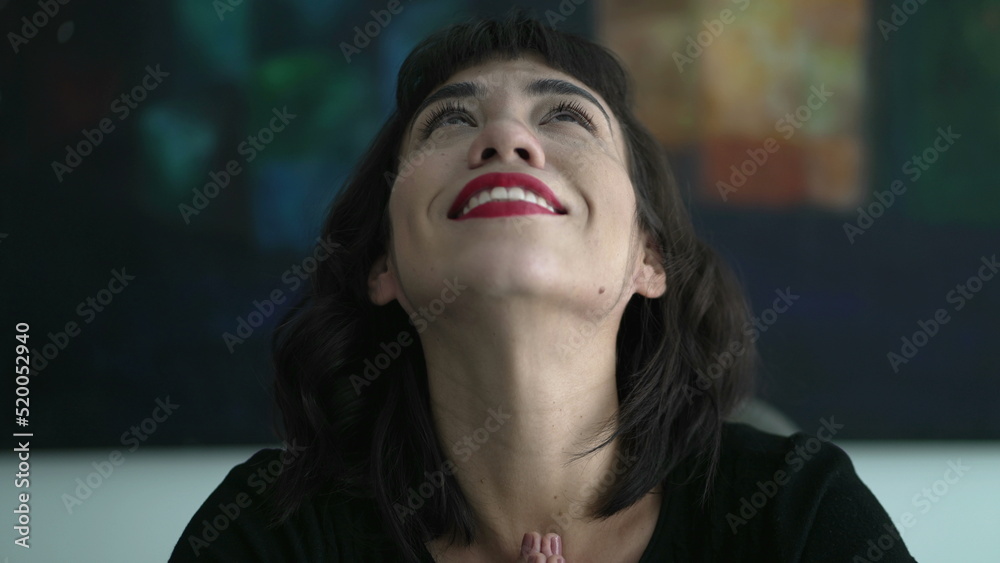 Hopeful person celebrating success. Grateful young woman having HOPE and FAITH Hopeful person celebrating success. Grateful young woman having HOPE and FAITH
