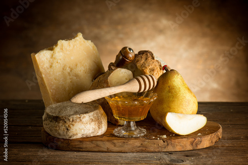 mixed of italian cheese with oney pear and bread photo