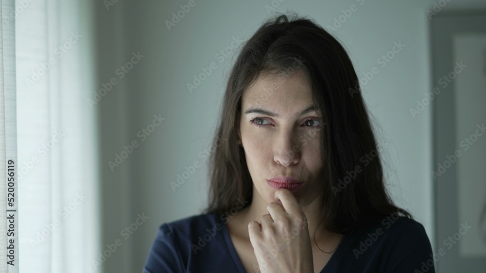 Pensive woman seeking solution to problem. Portrait of thoughtful person seeking inspiration Pensive woman seeking solution to problem. Portrait of thoughtful person seeking inspiration