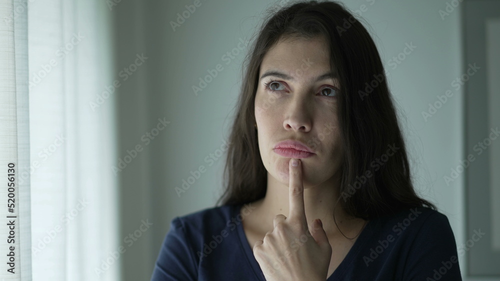 Pensive woman seeking solution to problem. Portrait of thoughtful person seeking inspiration Pensive woman seeking solution to problem. Portrait of thoughtful person seeking inspiration