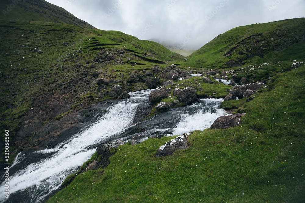 Skarðsáfossur Waterfall on Vagar in Faroe Islands Skarðsáfossur Waterfall on Vagar in Faroe Islands