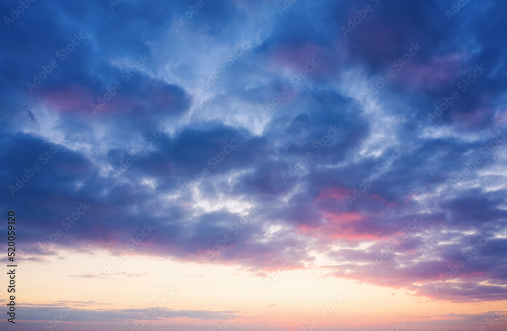 Beautiful evening sky with clouds at dusk . Sunset sky background.