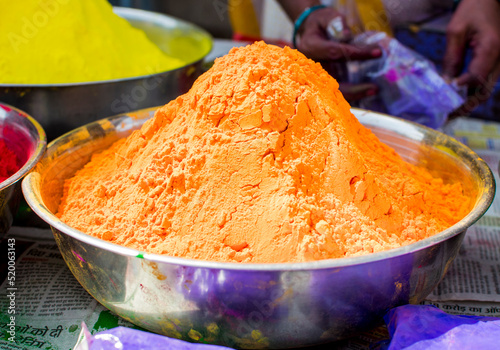Colorful traditional holi powder on Indian street. Happy holi.
