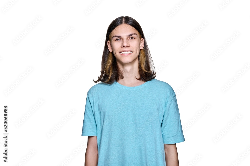 Portrait of smiling teenage guy looking at camera on white isolated background Portrait of smiling teenage guy looking at camera on white isolated background