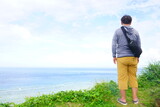 Man standing at Kasarizaki in Amami Oshima, Kagoshima, Japan - 日本 鹿児島県 奄美大島 笠利崎 観光客 男性