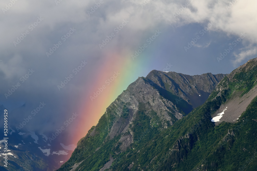 A rainbow brightens the landscape around Seward, Alaska.
