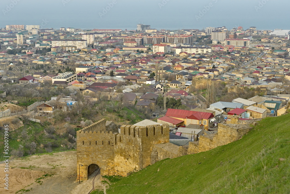 Derbent. Russia. April 09, 2021. Republic of Dagestan. View of the ancient city with a thousand-year history from the pre-Arab fortress of Naryn-Kara. The city of Derbent was founded in 438 AD.