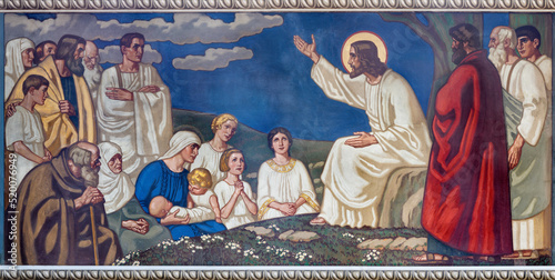 ZURICH, SWITZERLAND - JULY 1, 2022: The fresco of Jesus at the Sermon on the Mount Pfarrkirche Liebfrauen by Fritz Kunz (1906).