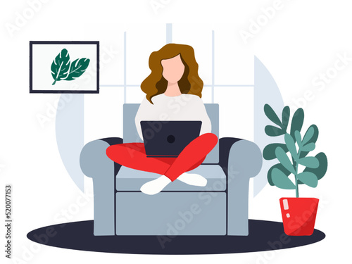 Home office and distance work concept. A young girl sitting at home with notebook and working 