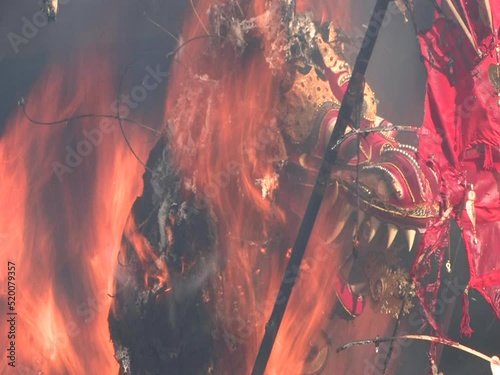 Bull casket burning for a balinese hindu cremation ceremony (Ngaben) of a member of the royal family (Tjokorda Puta Yuda Dharma from the family Puri Ubud) in Ubud, Bali July 28th 2012 photo