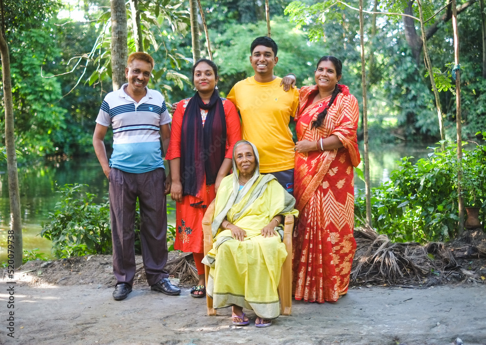 Bangladeshi family photo, south asian hindu religious nuclear family in