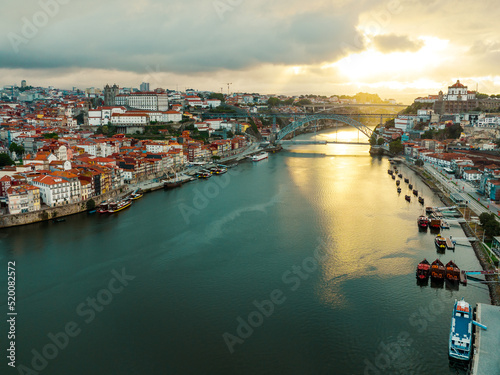 Porto Portugal Aerial View. Dom Luis Bridge at Sunrise. Porto, Portugal. Cityscape of Downtown Touristic Ribeira. Olt Town. Douro River.