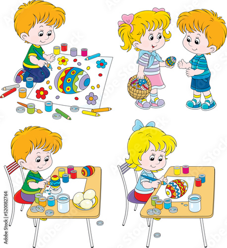 Vector cartoon set of happy little kids drawing decorated Easter eggs