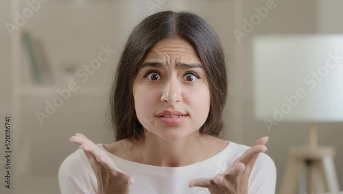 Portrait angry dissatisfied woman arabian hispanic girl expressing annoyance irritation sternly waving hands disagree with feminine discrimination nervous talking at camera make prohibition no gesture