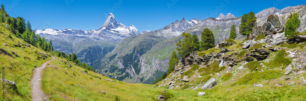 The panorama of swiss walliser alps with the Matterhorn peak over the mattertal valley.