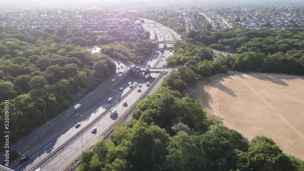 Aerial view of the waterworks roundabout in the morning sun looking east down the A406 dual carriageway into Woodford. London Aerial view of the waterworks roundabout in the morning sun looking east down the A406 dual carriageway into Woodford. London