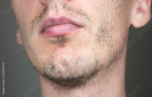 Fotografie, Obraz Short, sparse beard on mans face