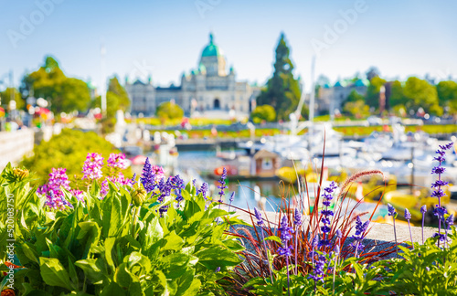 Victoria, British Columbia, Canada-blurred photo. Victoria Harbour and Parliament Buildings at sunny summer day