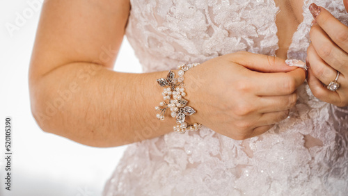 Wedding rings and bride, hands