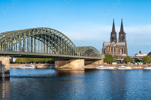 View of Cologne Cathedral and Hohenzollern Bridge in summer, Rhine River, North Rhine-Westphalia, Germany