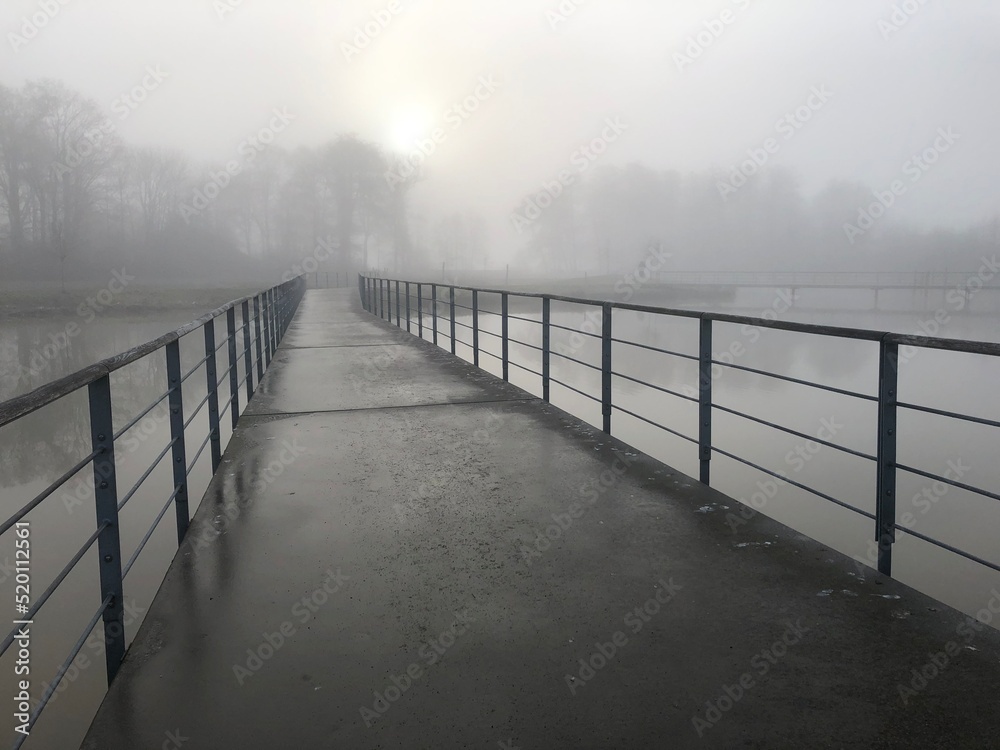 Bridge in the morning fog