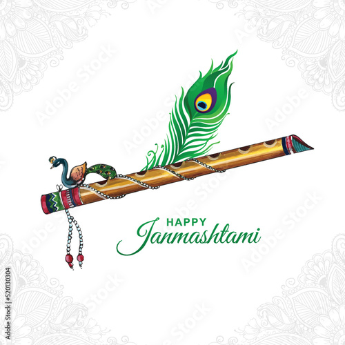 Beautiful lord krishna flute and peacock feather for janmashtami festival card background